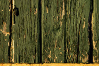 Painted wood shows its wear on the side of a pavilion in Discher Park, Horicon, Wisconsin.